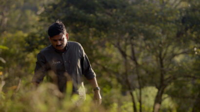 Joes Louies of the Wildlife Trust of India walks in a forst.